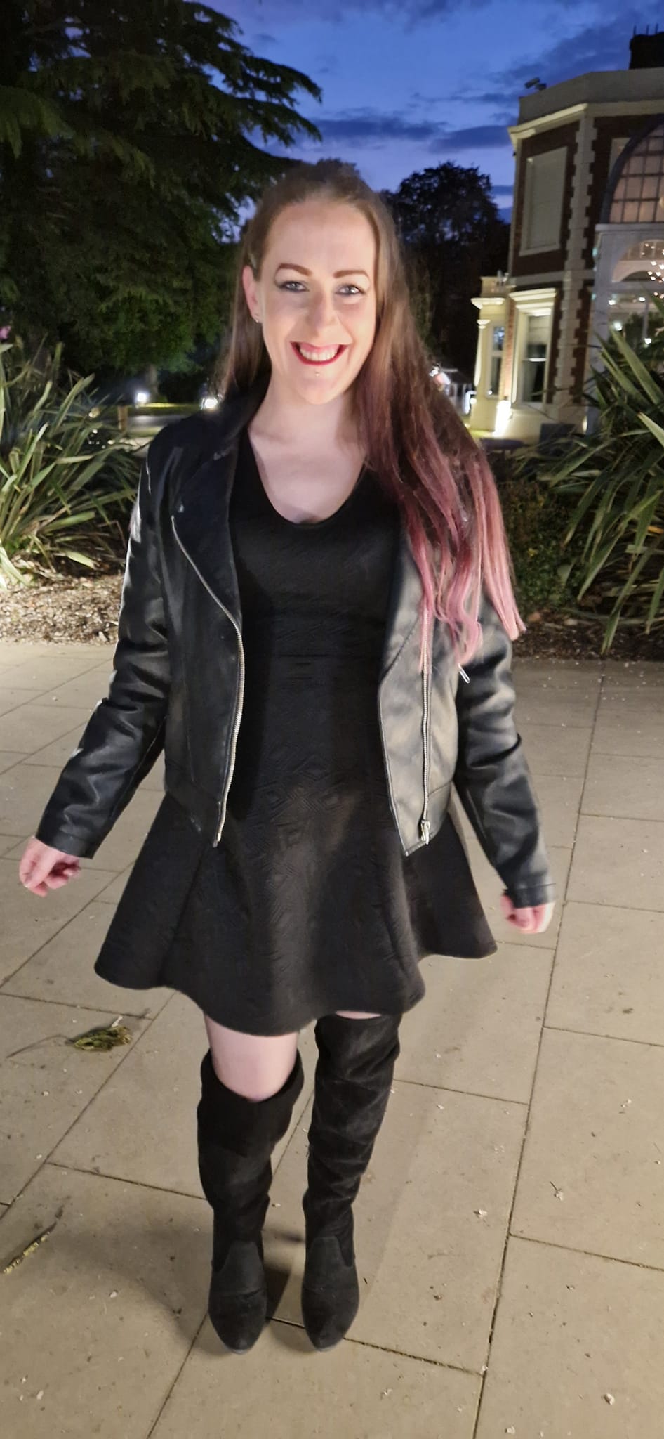 Donna smiling with a dog