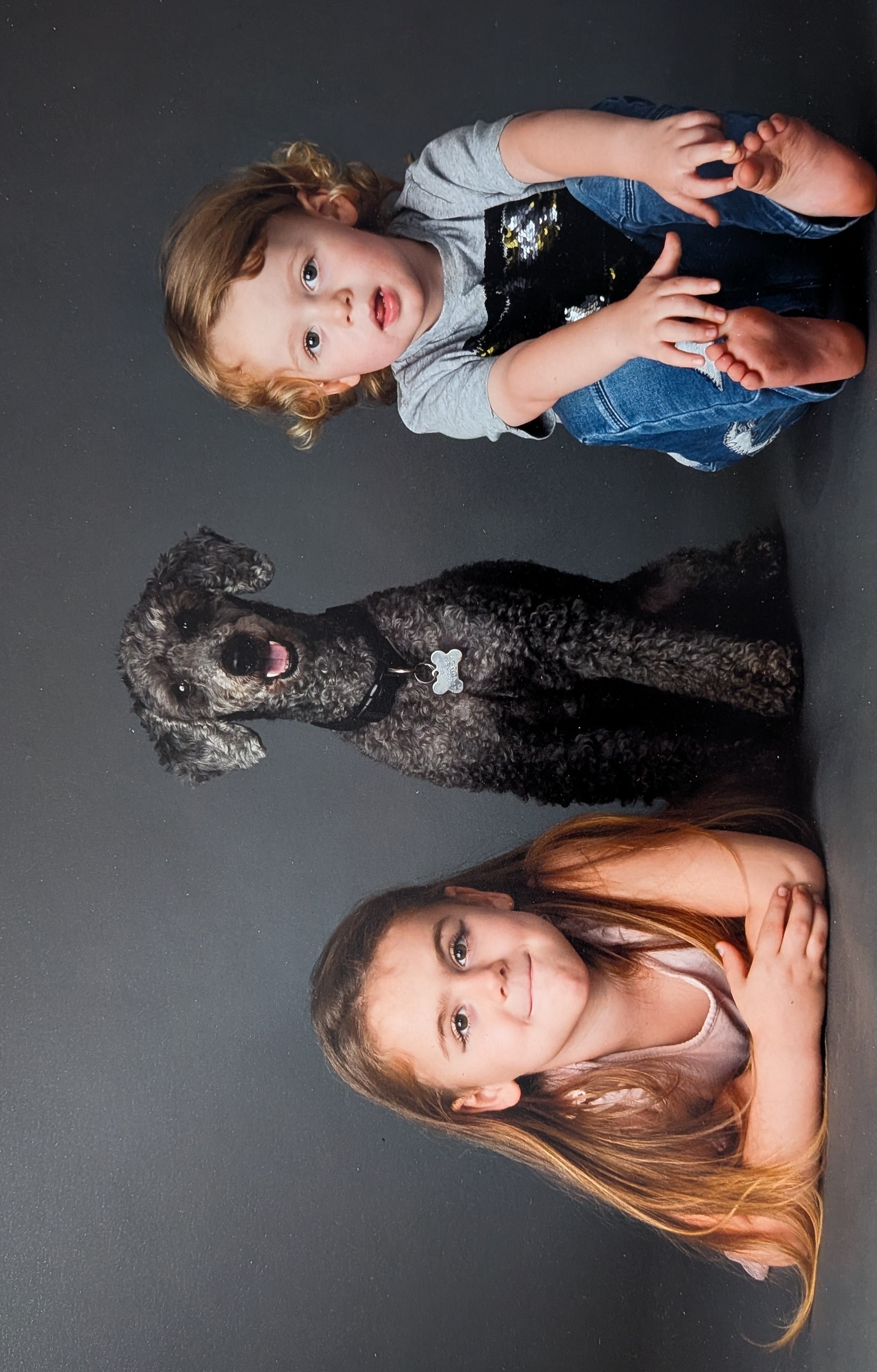 Kids playing with dog